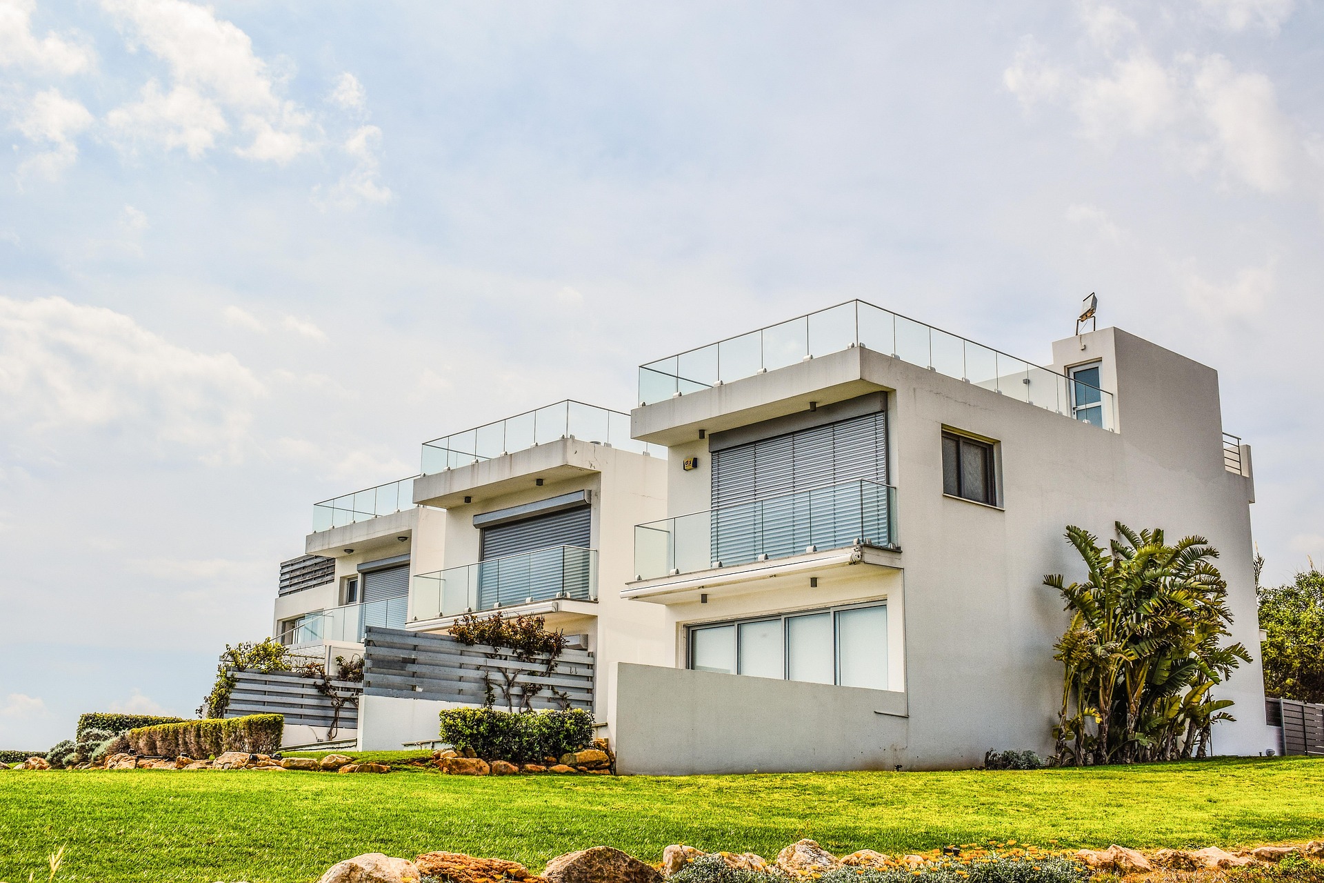 The Ridgeline Estate — featured luxury residence exterior with rooftop terrace